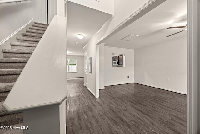 312 Glenellen Loop Rd, Midway Park, NC 28544 - entryway with dark wood-style flooring, ceiling fan, stairway, crown molding, and baseboards