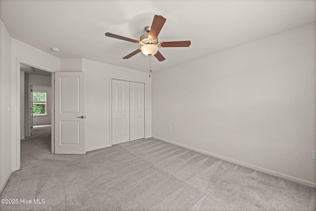312 Glenellen Loop Rd, Midway Park, NC 28544 - unfurnished bedroom featuring carpet, a closet, and baseboards