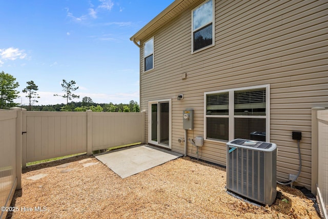 312 Glenellen Loop Rd, Midway Park, NC 28544 - rear view of property featuring central AC unit and a patio area