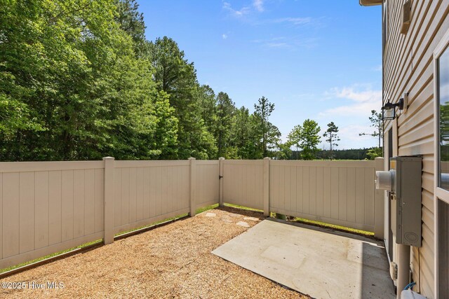 312 Glenellen Loop Rd, Midway Park, NC 28544 - fenced backyard featuring a patio area