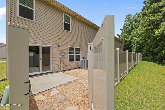 312 Glenellen Loop Rd, Midway Park, NC 28544 - rear view of property with a patio and central AC unit