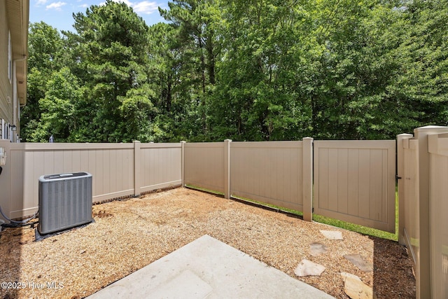 312 Glenellen Loop Rd, Midway Park, NC 28544 - fenced backyard with central air condition unit and a patio