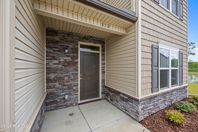 312 Glenellen Loop Rd, Midway Park, NC 28544 - view of exterior entry with stone siding