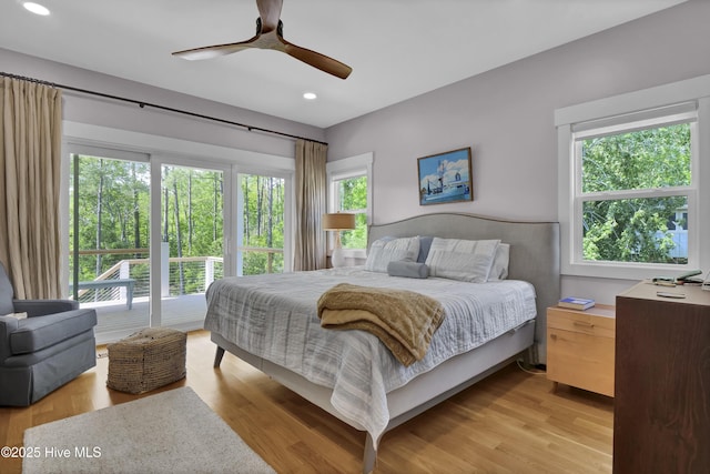 1246 Heron Run Dr, Wilmington, NC 28403 - bedroom featuring multiple windows, recessed lighting, light wood-style floors, and a ceiling fan