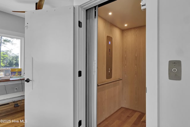 1246 Heron Run Dr, Wilmington, NC 28403 - corridor with light wood-style flooring, recessed lighting, and elevator
