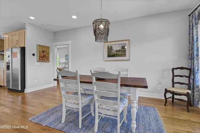 1246 Heron Run Dr, Wilmington, NC 28403 - dining space with baseboards, light wood-type flooring, recessed lighting, and a chandelier