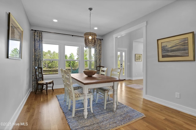 1246 Heron Run Dr, Wilmington, NC 28403 - dining space with light wood-style floors, baseboards, a chandelier, and recessed lighting