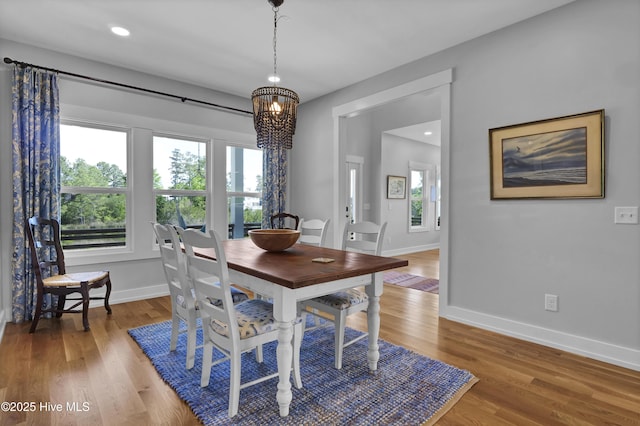 1246 Heron Run Dr, Wilmington, NC 28403 - dining room with baseboards, wood finished floors, a chandelier, and recessed lighting