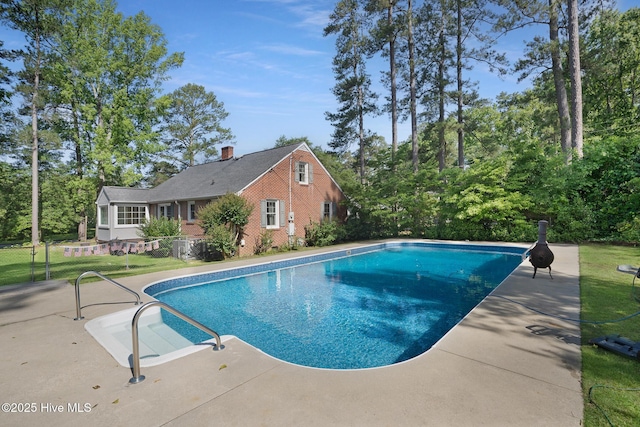 1206 Lancaster Ln, Rockingham, NC 28379 - swimming pool with a patio area