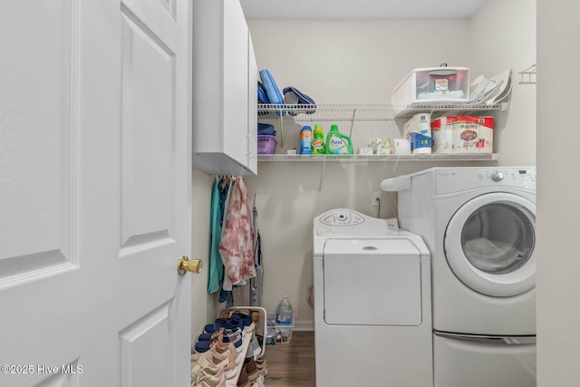 154 Dockside Dr, Jacksonville, NC 28546 - laundry room featuring washer and clothes dryer, cabinet space, and wood finished floors