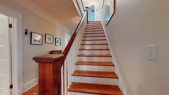 305 E New Hampshire Ave, Southern Pines, NC 28387 - stairway featuring wood finished floors and baseboards