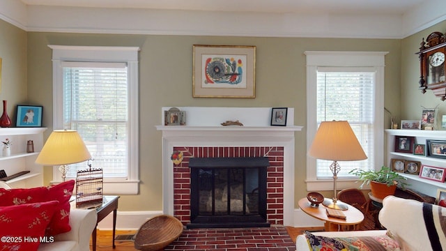 305 E New Hampshire Ave, Southern Pines, NC 28387 - living room with a fireplace and plenty of natural light