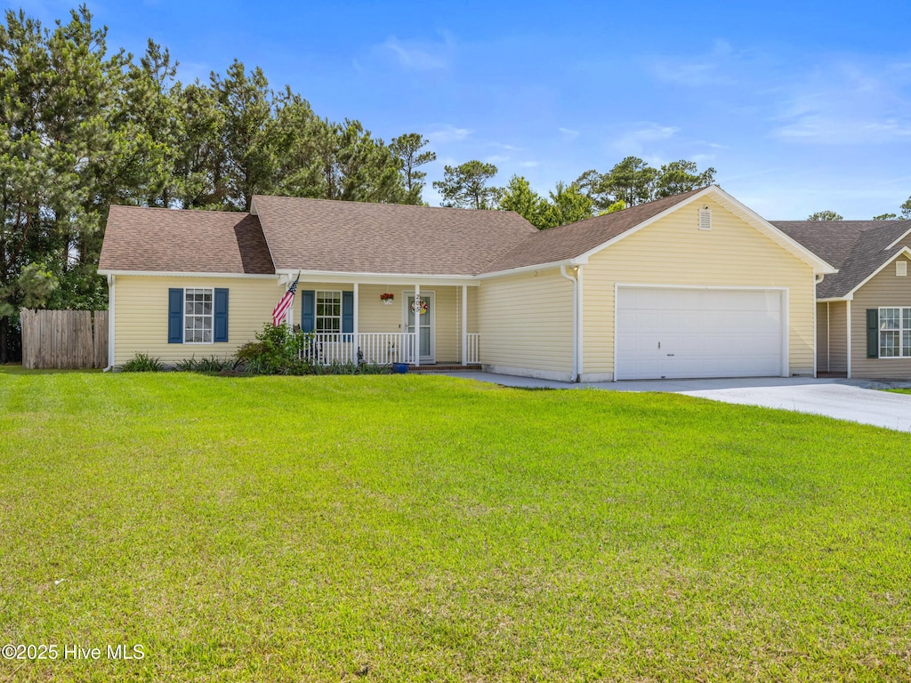 205 N Stephanie Ct, Jacksonville, NC 28540 - ranch-style house featuring a porch, a garage, driveway, and roof with shingles