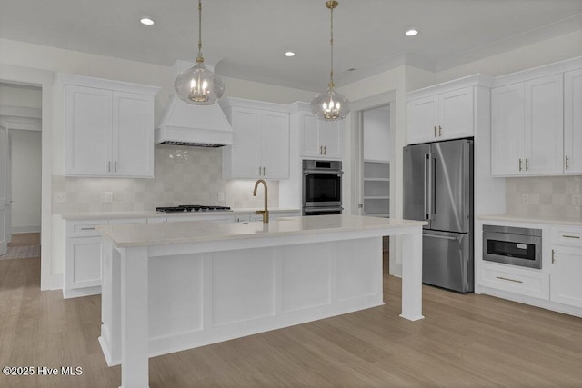 324 Grayhawk Cir, Wilmington, NC 28411 - kitchen featuring appliances with stainless steel finishes, light countertops, tasteful backsplash, white cabinets, and recessed lighting
