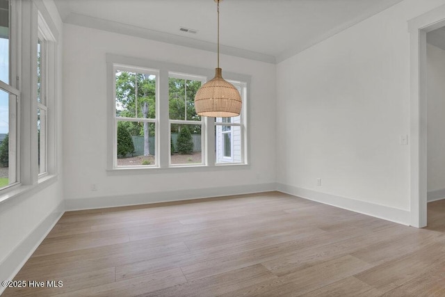 324 Grayhawk Cir, Wilmington, NC 28411 - unfurnished dining area featuring light wood-type flooring and baseboards