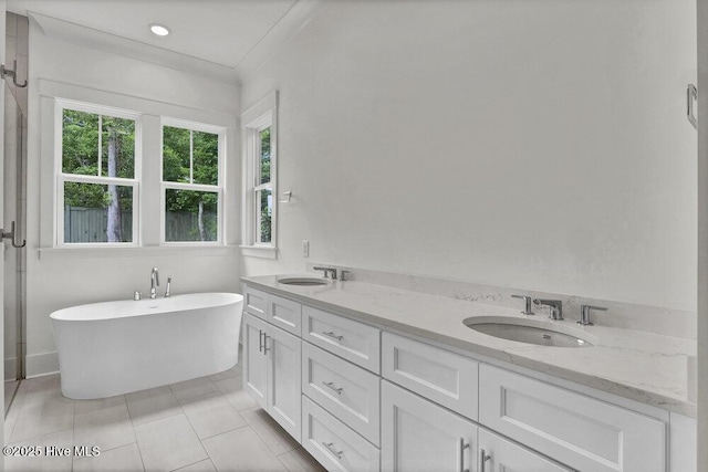 324 Grayhawk Cir, Wilmington, NC 28411 - full bathroom featuring a soaking tub, double vanity, and tile patterned floors
