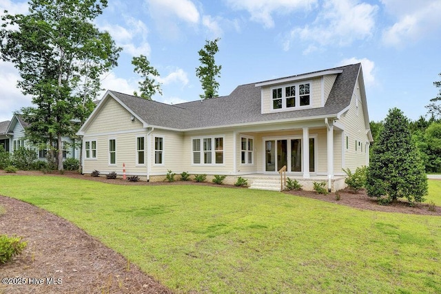 324 Grayhawk Cir, Wilmington, NC 28411 - rear view of property featuring a lawn, roof with shingles, and a porch