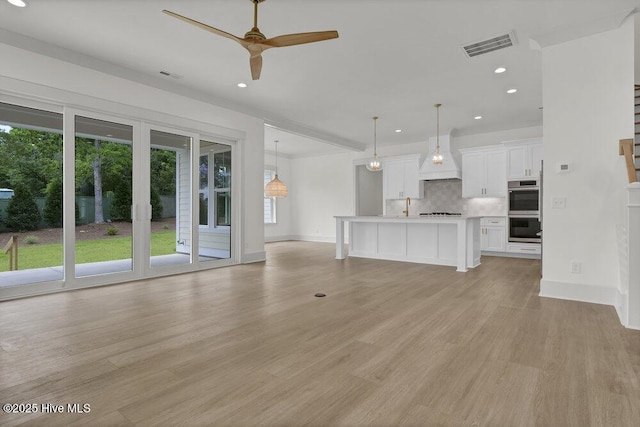 324 Grayhawk Cir, Wilmington, NC 28411 - unfurnished living room with recessed lighting, light wood-style floors, and ceiling fan