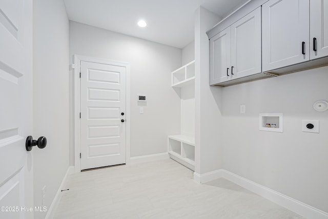 947 Ashburton Rd SE, Bolivia, NC 28422 - laundry room with electric dryer hookup, cabinet space, baseboards, washer hookup, and recessed lighting