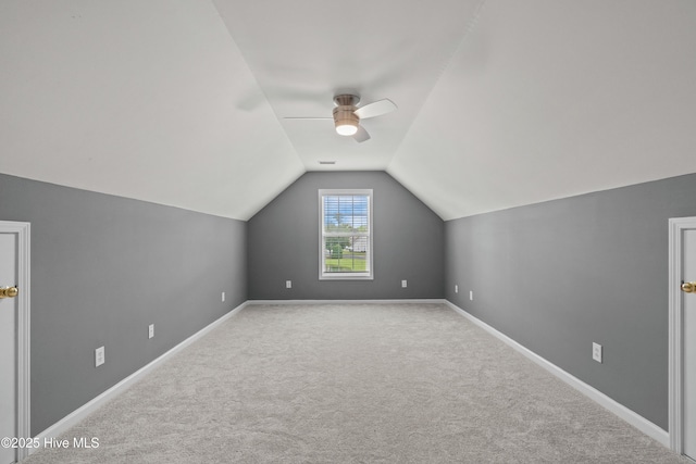 94 Field Planters Cir, Calabash, NC 28467 - additional living space featuring ceiling fan, carpet, lofted ceiling, and baseboards