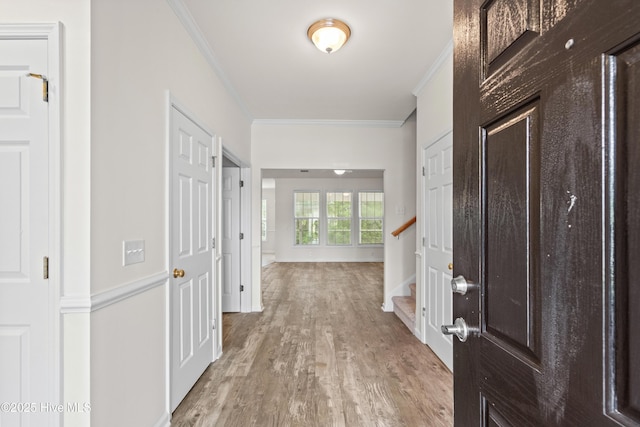 94 Field Planters Cir, Calabash, NC 28467 - foyer entrance featuring crown molding, light wood-type flooring, stairway, and baseboards