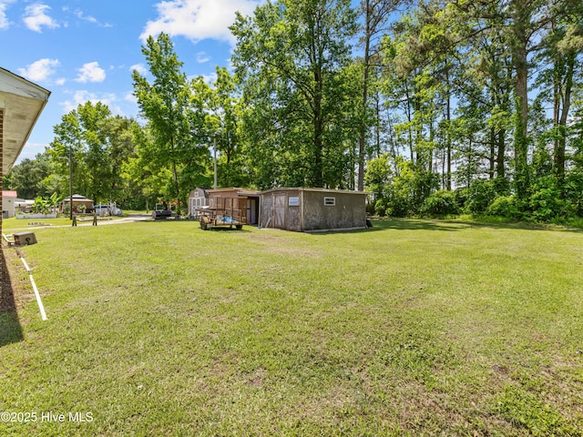 323 Alexander Rouse Rd, Kinston, NC 28504 - view of green lawn with view of scattered trees