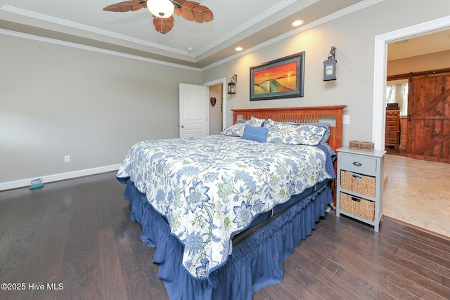 104 Soundside Estates Dr, Grandy, NC 27939 - bedroom with a barn door, dark wood-style flooring, ornamental molding, baseboards, and recessed lighting