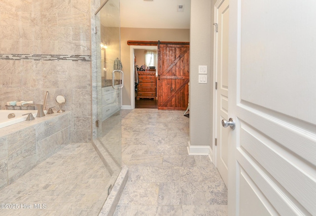 104 Soundside Estates Dr, Grandy, NC 27939 - full bath featuring a shower stall, a bath, stone finish flooring, and baseboards