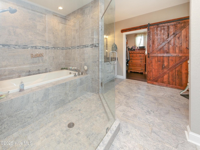104 Soundside Estates Dr, Grandy, NC 27939 - bathroom featuring a stall shower, a garden tub, and a spacious closet