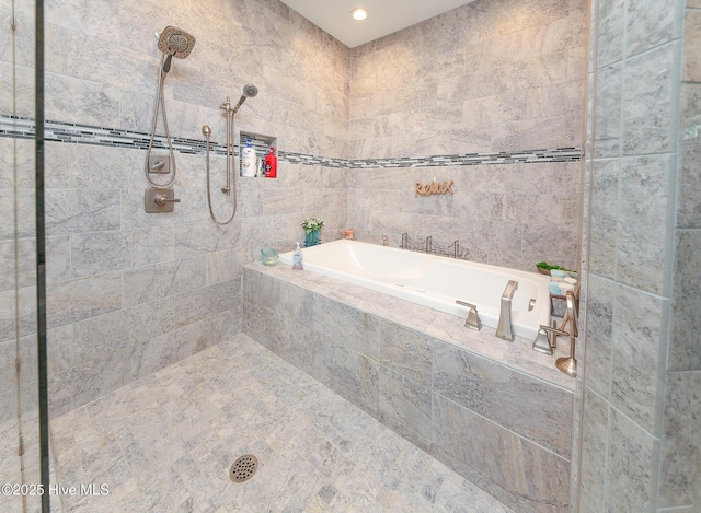 104 Soundside Estates Dr, Grandy, NC 27939 - bathroom featuring a tile shower, a garden tub, and tile walls