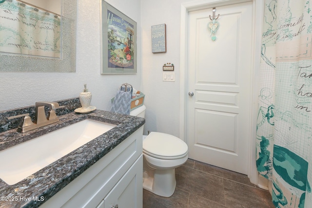 104 Soundside Estates Dr, Grandy, NC 27939 - bathroom with vanity, toilet, and a shower with curtain