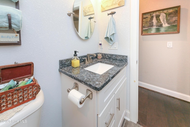 104 Soundside Estates Dr, Grandy, NC 27939 - bathroom with vanity, toilet, and baseboards