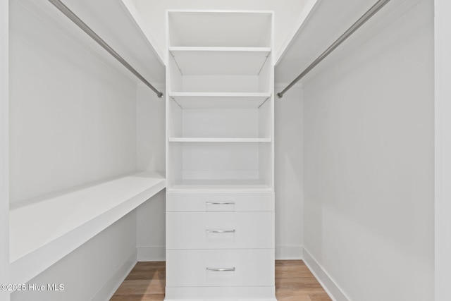 2705 E Oak Island Dr, Oak Island, NC 28465 - walk in closet with wood finished floors
