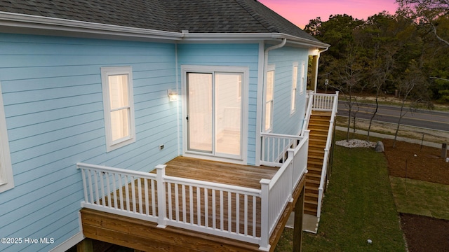 2705 E Oak Island Dr, Oak Island, NC 28465 - deck at dusk featuring stairs