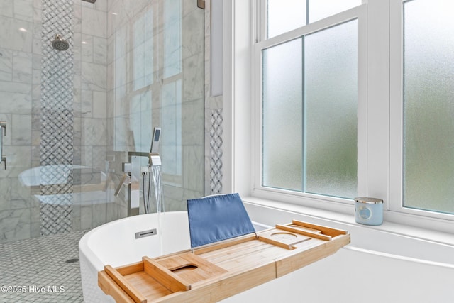 2705 E Oak Island Dr, Oak Island, NC 28465 - bathroom featuring a shower stall, plenty of natural light, and a freestanding tub