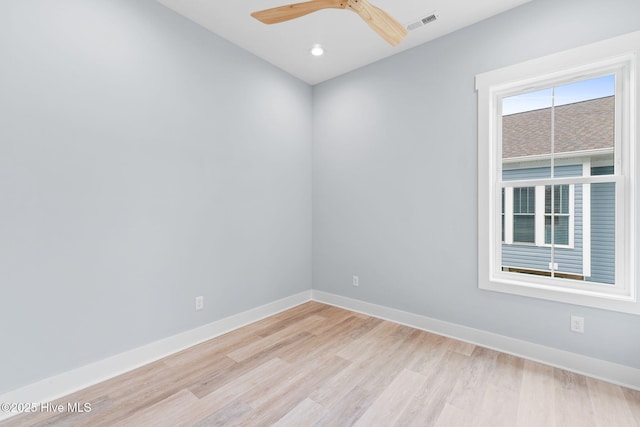 2705 E Oak Island Dr, Oak Island, NC 28465 - empty room with light wood-type flooring, baseboards, a ceiling fan, and recessed lighting