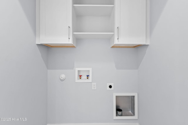 2705 E Oak Island Dr, Oak Island, NC 28465 - laundry area with electric dryer hookup, washer hookup, cabinet space, and hookup for a gas dryer