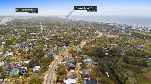 2705 E Oak Island Dr, Oak Island, NC 28465 - aerial view of property and surrounding area featuring a nearby body of water
