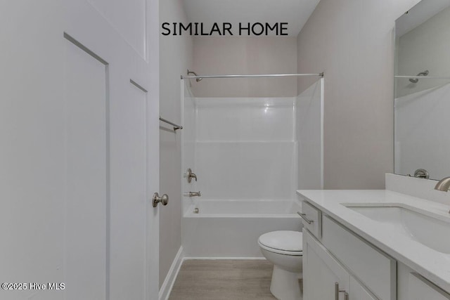 98 NE Dr NW, Calabash, NC 28467 - bathroom featuring toilet, vanity, tub / shower combination, and wood finished floors