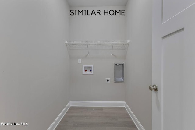 98 NE Dr NW, Calabash, NC 28467 - washroom with electric dryer hookup, hookup for a washing machine, wood finished floors, and baseboards