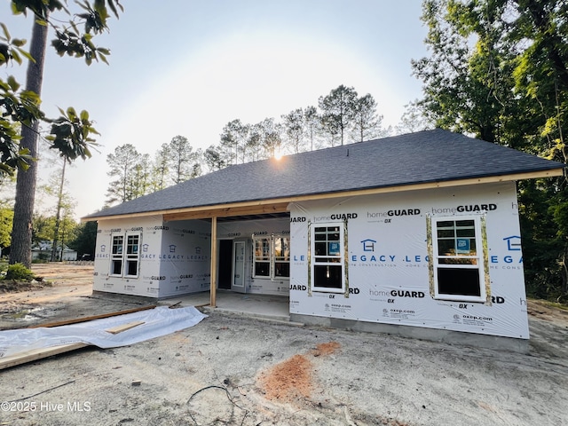 311 Front St, Vass, NC 28394 - rear view of house with a shingled roof