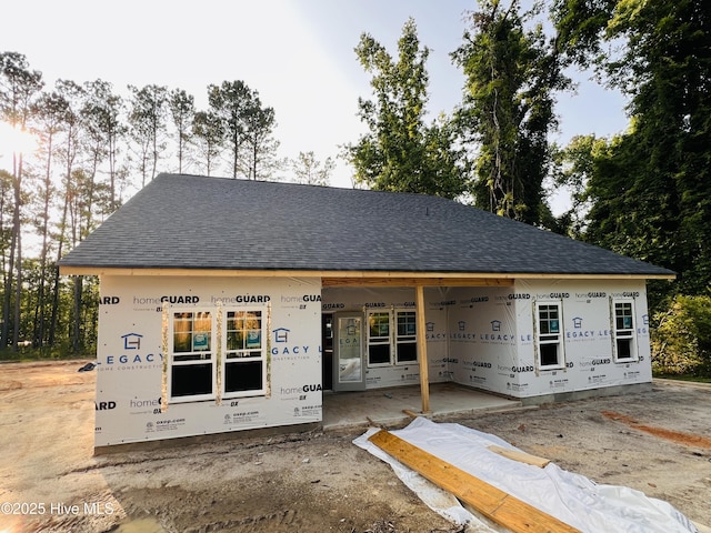 311 Front St, Vass, NC 28394 - view of front of home with a shingled roof