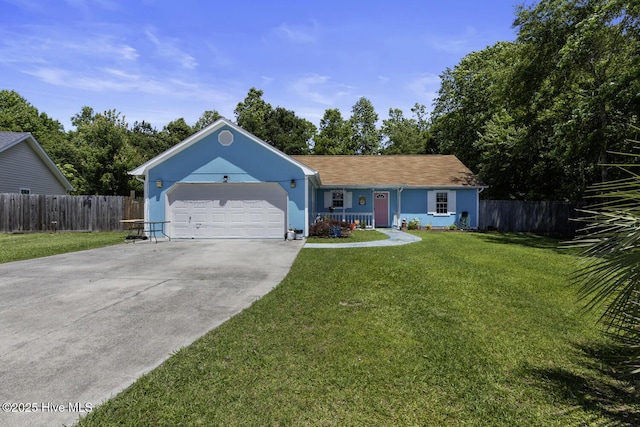 107 Foxlair Dr, Hubert, NC 28539 - ranch-style house with concrete driveway and an attached garage