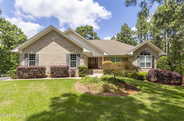 113 Dubose Dr, West End, NC 27376 - single story home with brick siding and a front yard