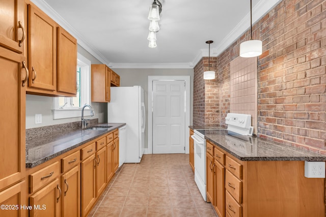 114 N 16th St, Wilmington, NC 28401 - kitchen with white appliances, brick wall, dark stone counters, brown cabinets, and ornamental molding