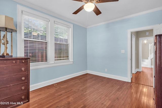 114 N 16th St, Wilmington, NC 28401 - unfurnished bedroom featuring hardwood / wood-style flooring, ornamental molding, and ceiling fan