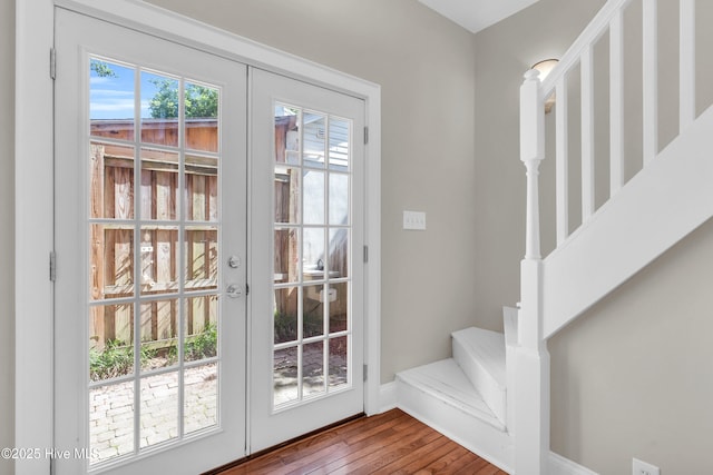 114 N 16th St, Wilmington, NC 28401 - doorway to outside featuring french doors, hardwood / wood-style floors, and stairway