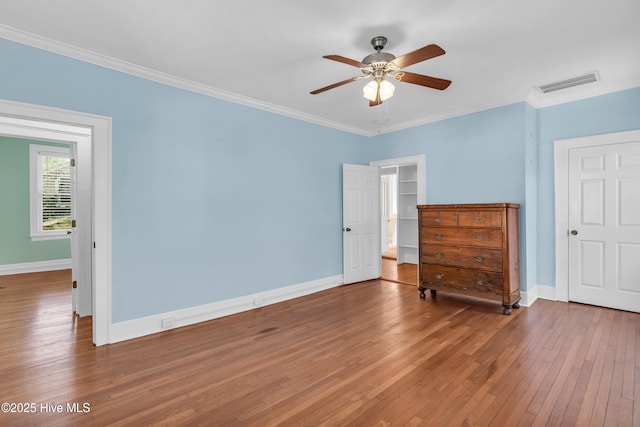 114 N 16th St, Wilmington, NC 28401 - bedroom featuring hardwood / wood-style floors, crown molding, and a ceiling fan