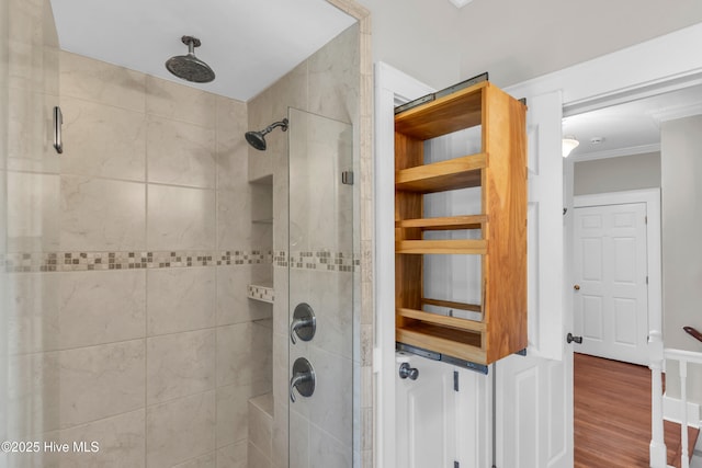 114 N 16th St, Wilmington, NC 28401 - full bathroom with a shower stall, ornamental molding, and wood finished floors