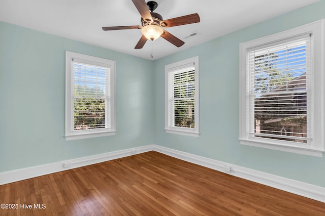 114 N 16th St, Wilmington, NC 28401 - unfurnished room with wood-type flooring, healthy amount of natural light, and ceiling fan